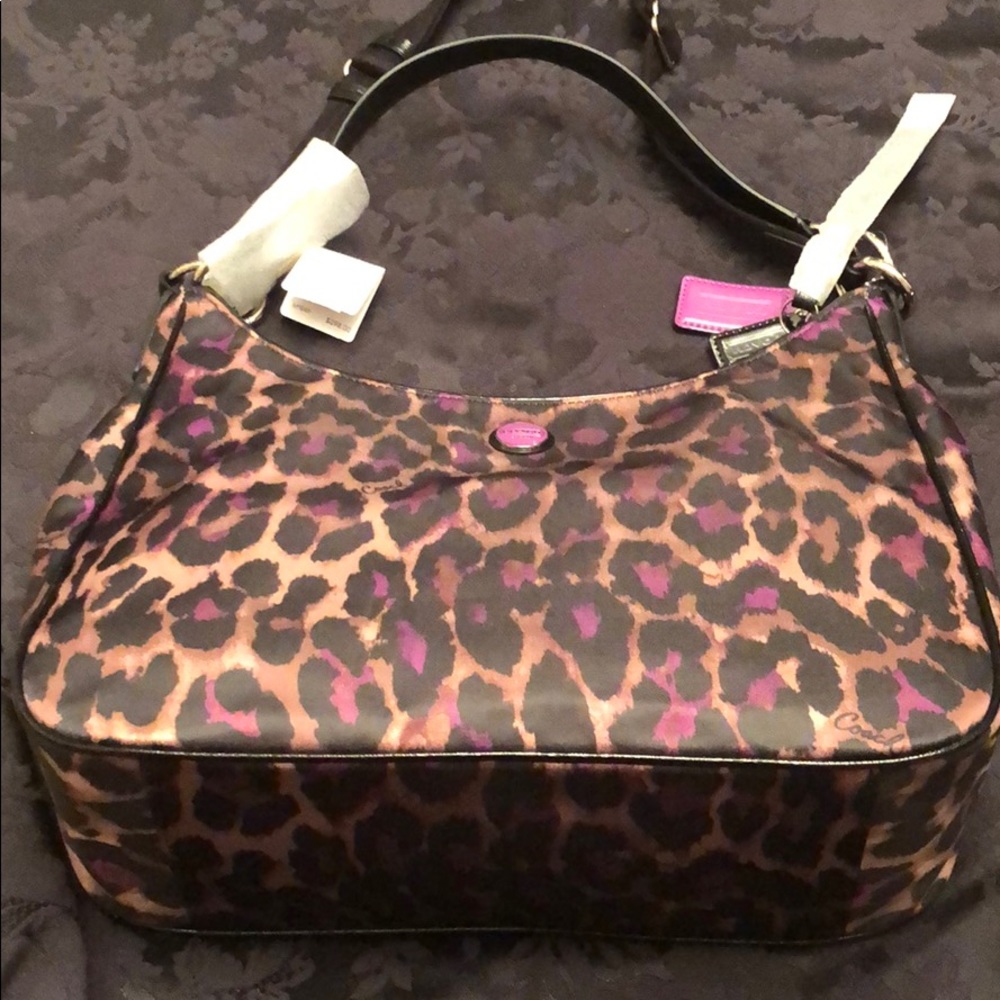 Brand new violet jaguar Coach hobo bag.